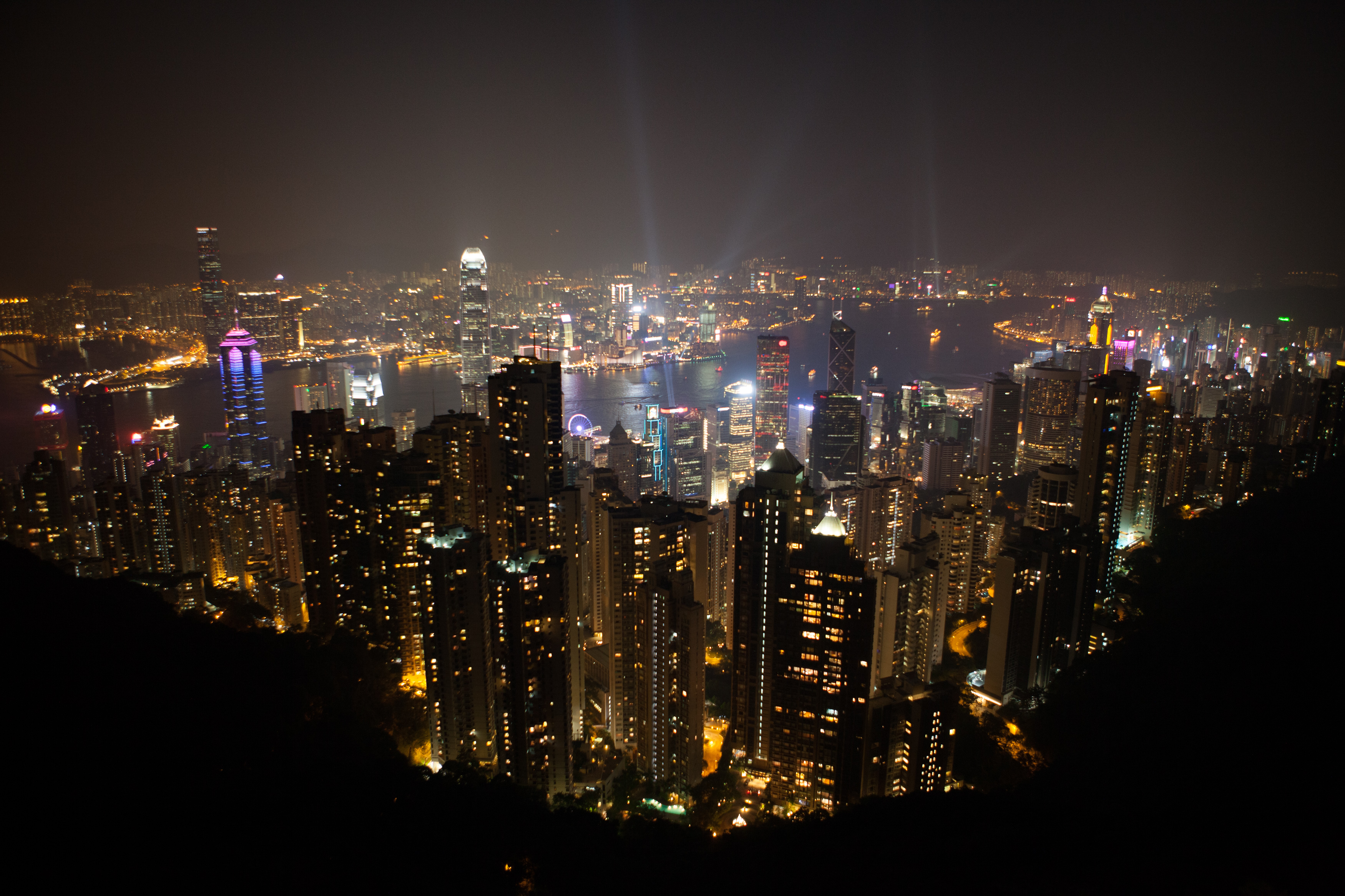 Night view on the many buildings of Hong Kong, and light animations (colors, beams)
